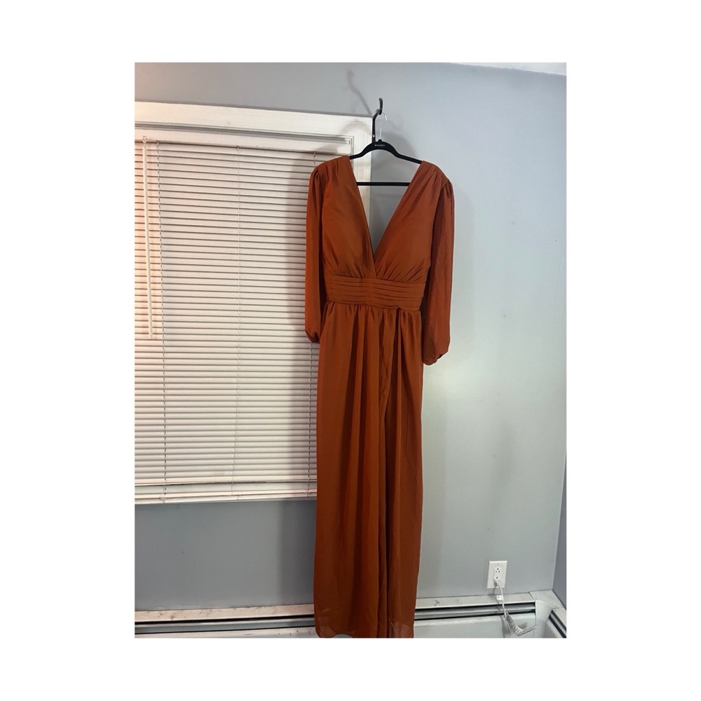 Women’s plus sized burnt orange bridesmaid dress with pockets. Never worn